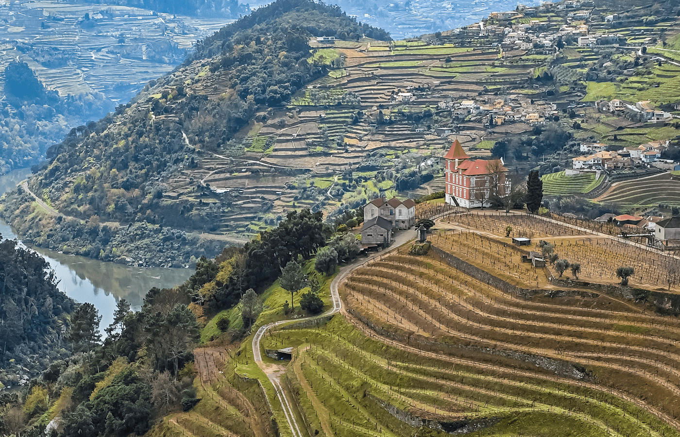 A hillside home overlooking the Douro River, surrounded by the valley’s remarkable terraced vineyards
